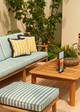 Raya Turchese on an outdoor sofa in collaboration with Neptune at RHS Chelsea Flower Show
